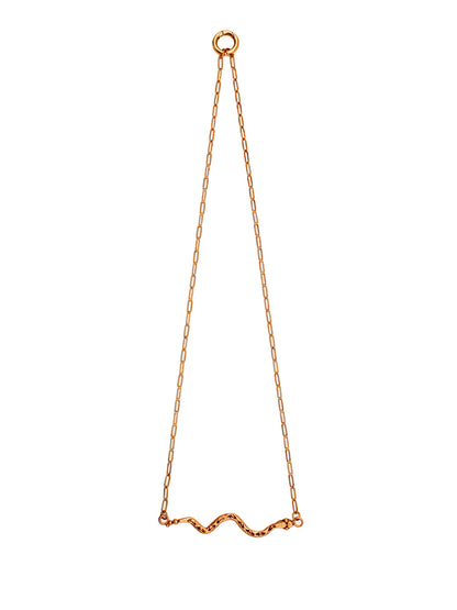 Gold chain necklace on a white background