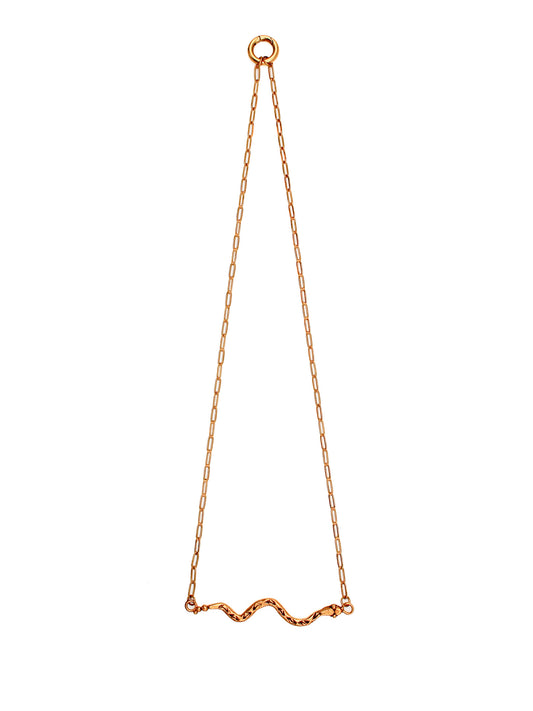 Gold chain necklace on a white background