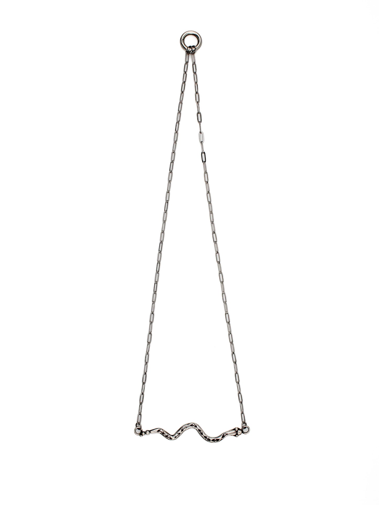 Silver snake necklace on a white background