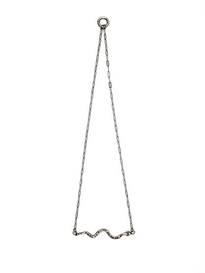 Silver snake necklace on a white background