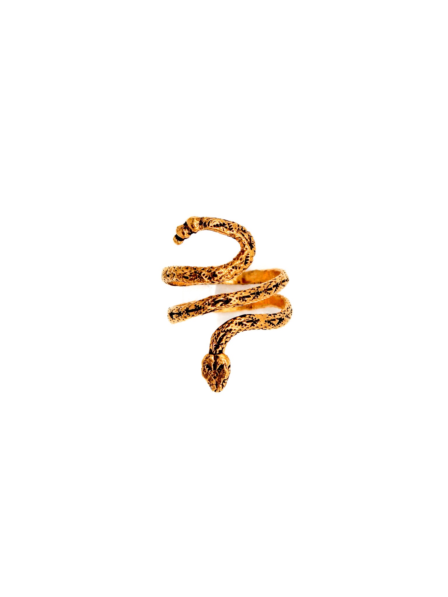 Gold snake-shaped ring on a white background