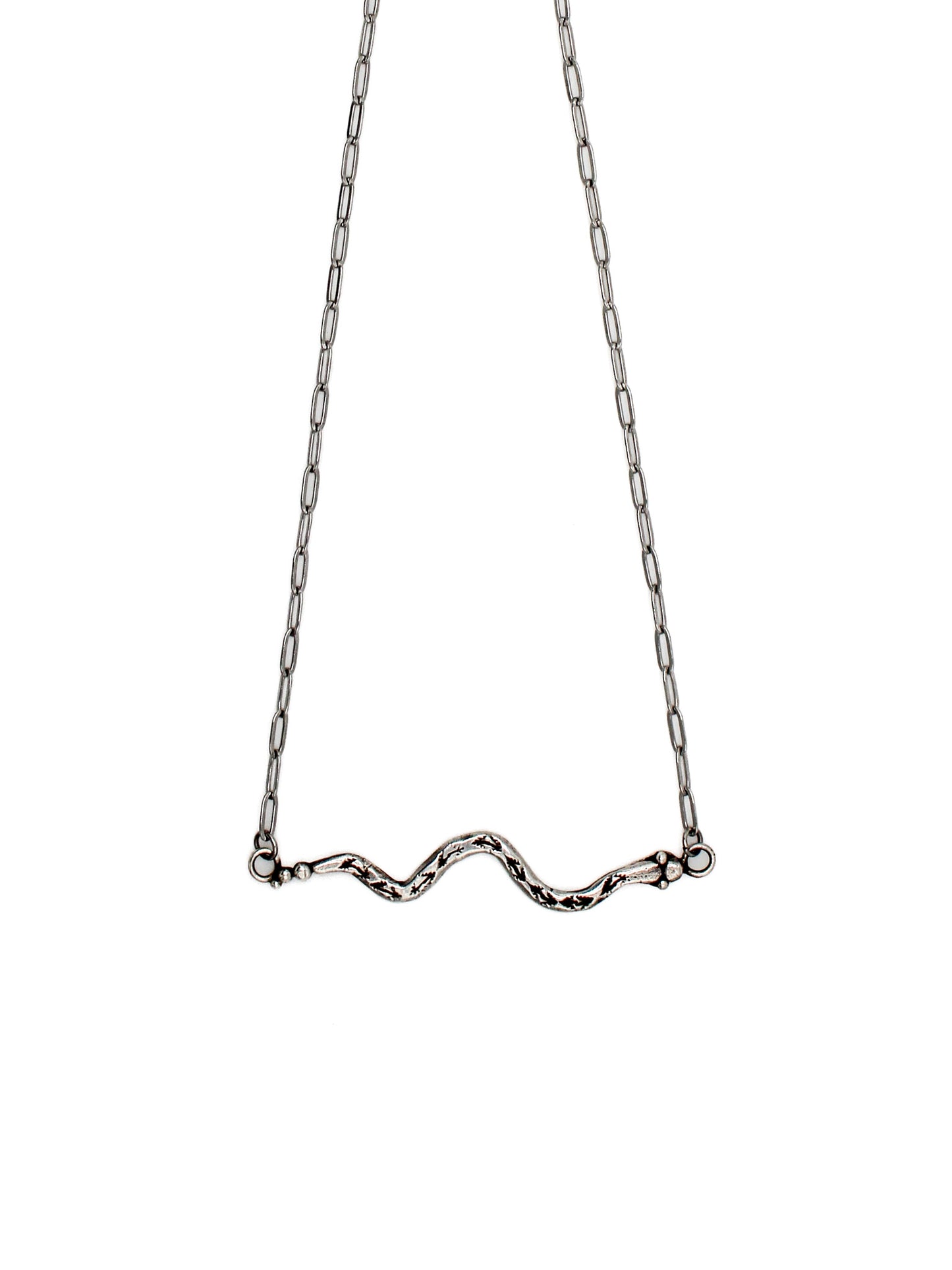 Silver necklace with a snake design on a white background 